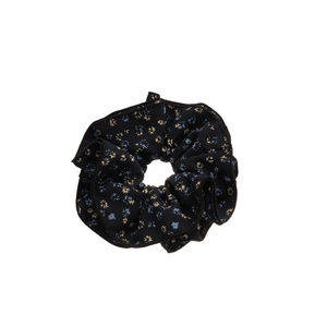 Floral print double-layer fabric scrunchie in dark blue with delicate petal patterns