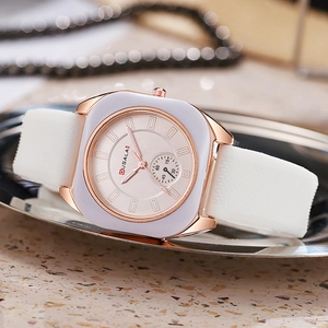 Minimalist square quartz watch for women featuring a rose gold frame and white silicone strap