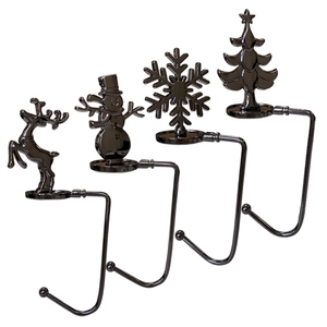 Set of four dark metal Christmas mantle hooks with reindeer, snowman, snowflake and tree