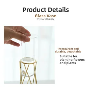 Detail showing the removal of a detachable glass tube from a gold metal vase stand