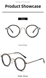 Detail view of vintage round metal glasses in gunmetal grey with dual-ring frame design