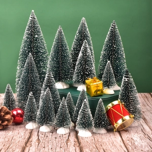 Mini bottle brush Christmas trees with snow effect and festive holiday ornaments