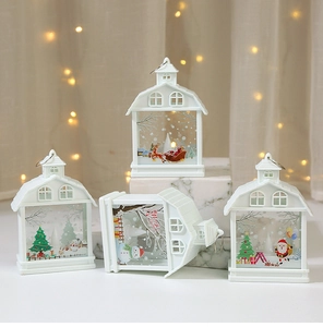 Close-up of white LED Christmas lanterns with festive Santa and reindeer patterns