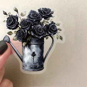 Detail of transparent black rose and vintage watering can sticker for scrapbooking