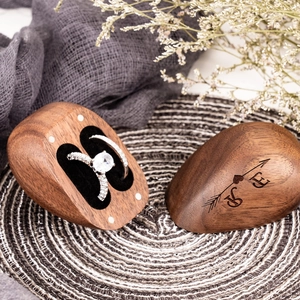 Elegant heart-shaped walnut wood ring box with engraved lid and diamond engagement ring