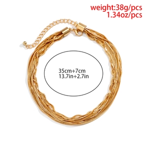 Detailed view of layered gold snake chain necklace with lobster clasp and weight specs