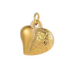 Detail of 18k gold heart pendant with mirror polish and embossed texture design