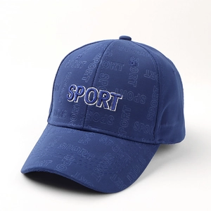 Detail of royal blue baseball cap with 3D Sport embroidery and textured fabric