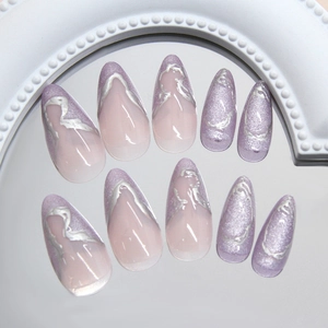 Mystic purple cat-eye almond press-on nails with silver 3D metallic wave patterns