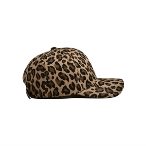 Close-up of curved brim and side profile of leopard print cotton baseball cap