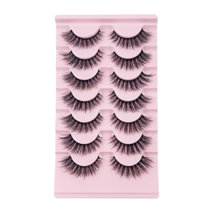 Professional 7 pairs set of natural black faux eyelashes on pink tray in macro view