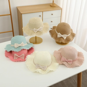Kids summer straw hats with polka dot bows and wavy brims in six assorted colors