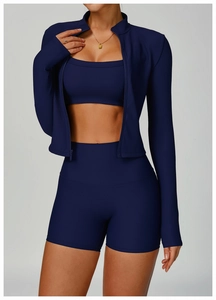 Close-up of ribbed knit texture on a navy blue slim-fit stand collar yoga jacket