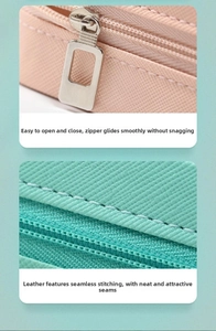 Close-up of pink and mint leather jewelry box with silver zipper and fine stitching