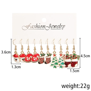 Detailed set of five pairs of enamel Christmas earrings with festive holiday motifs