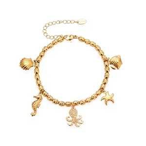 Vista detallada de pulsera de acero inoxidable de tema oceánico con colgante de pulpo