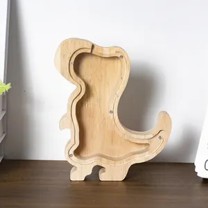 Detailed view of dinosaur shaped wooden piggy bank with clear acrylic front panel