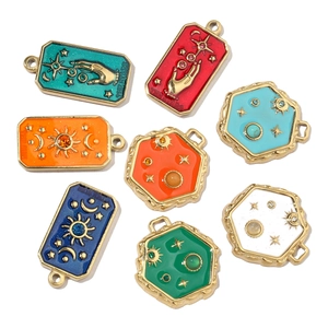 French sun and star sun motifs on geometric gold-plated enamel pendant charms