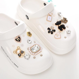 DIY pearl and floral charms set for white clogs featuring bear and perfume bottle motifs