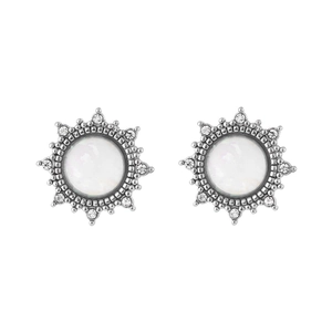 Silver starburst earrings with white opal and zircon stones on a white background