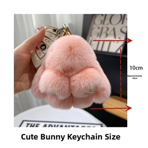Detailed view of pink rex rabbit fur bunny keychain showing 10cm height and plush texture
