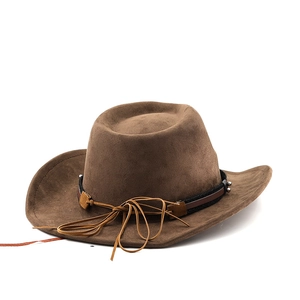 Macro view of Western cowboy hat details with braided black band and metal ornaments