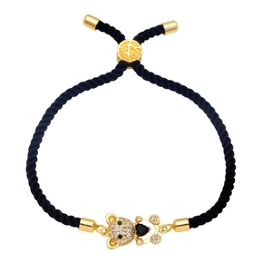 Adjustable woven black rope bracelet with a gold teddy bear and black heart gem