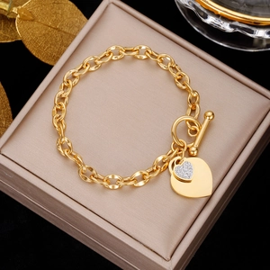 Golden stainless steel chain bracelet with double heart charms and OT toggle clasp