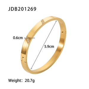 Brazalete rígido de acero inoxidable dorado pulido con incrustaciones de circón
