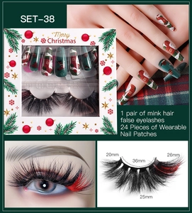 Christmas beauty set featuring mink eyelashes with red tips and green festive press-on nails
