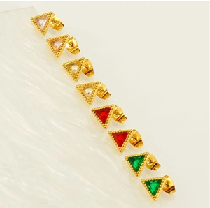 Detail view of gold-plated triangle earrings with pink, white, red, and green zircon stones