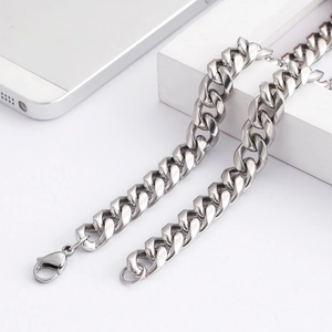 Detailed view of silver stainless steel Cuban chain necklace with lobster clasp