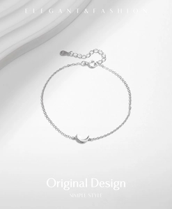 Detailed view of S925 sterling silver moon bracelet with adjustable extender and logo tag
