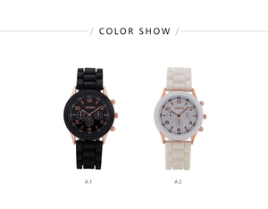 Detail view of stylish Geneva quartz watches in black and off-white with silicone straps