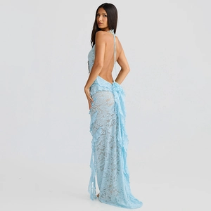 Detail view of backless light blue lace dress with ruffle trim and elegant texture
