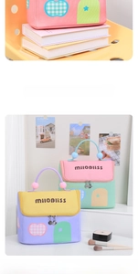Detail of cute house-shaped storage bag with colorful PU fabric and decorative ball handle
