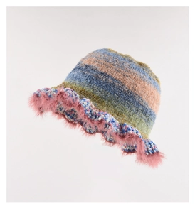 Detail of colorful knitted bucket hat with pink faux fur trim and multi-color yarn texture