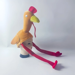 Funny plush turkey hat for Thanksgiving party costume featuring yellow feathers and red legs