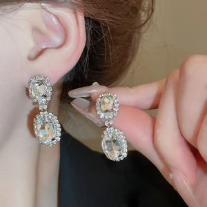 Luxury oval crystal drop earrings and necklace set with silver plating and pavé accents
