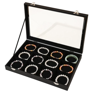 Black jewelry box with glass lid and 12 compartments for bracelets and bangles
