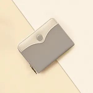 Short bifold women's wallet in Morandi grey and cream leather with snap and zipper closure