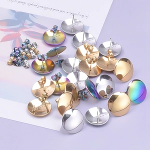 Close-up of polished 304 stainless steel stud earrings in gold, silver, and rainbow colors