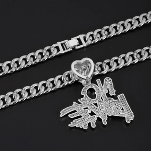 Macro shot of silver Cuban link chain featuring a Forever pendant and folding clasp