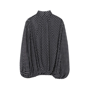 Black and white polka dot cloak blouse featuring a high neck and elegant lantern sleeves