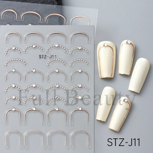 Détail des stickers ongles 5D STZ-J11 or rose avec motifs en relief et cristaux brillants