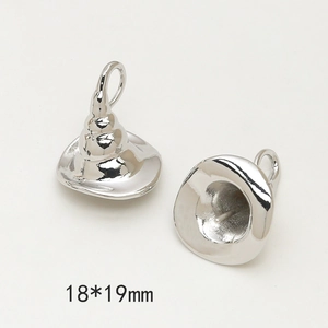 Detailed macro view of silver witch hat metal pendants with 18x19mm size markings