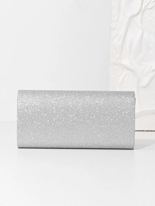 Close-up of silver glitter晚宴包 texture on a minimalist rectangular evening clutch bag