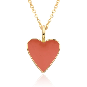 Macro view of a 14K gold-plated heart pendant with vibrant red enamel on a cable chain