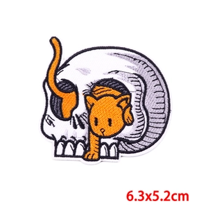 Macro detail of cute cat embroidery patch with dimensions 6.3x5.2cm for DIY clothing