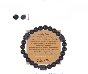 Detail of 8mm matte black beads and lava stone bracelet with sentimental gift card